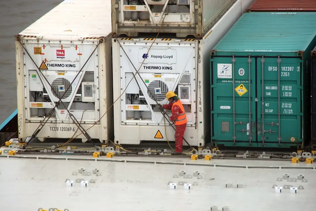 Refrigerated shipping containers secured aboard the cargo ship MS Dornbusch.