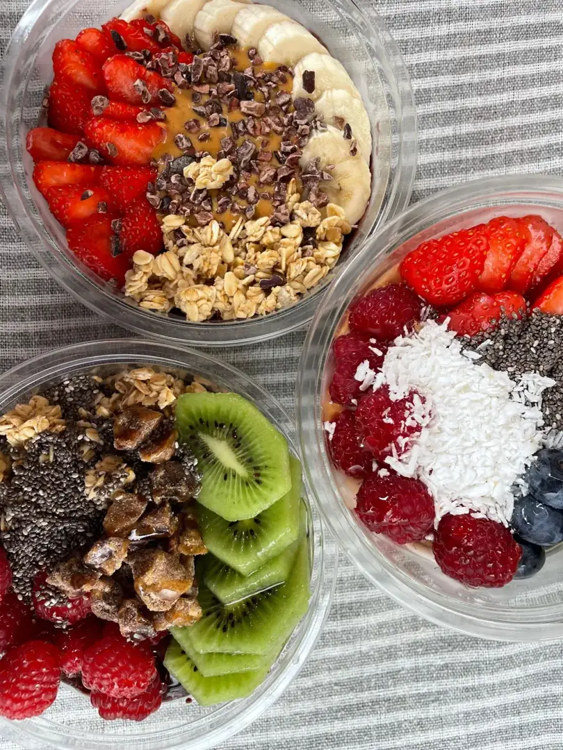 Three real fruit-topped bowls from The Açaí Bar